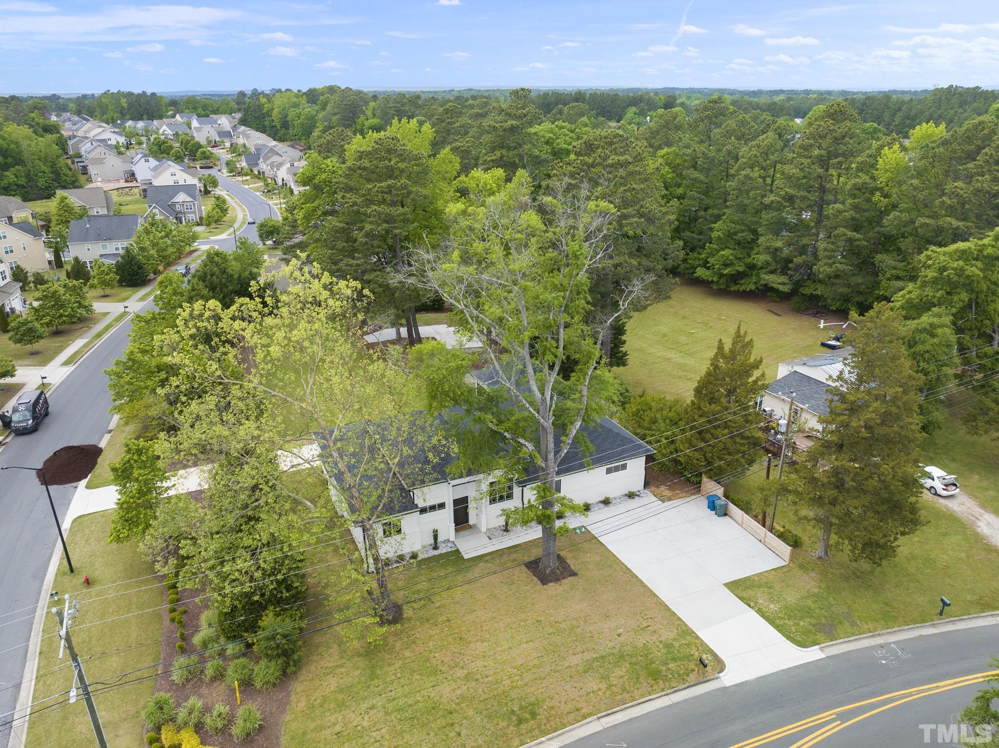 1920 Cook Road Durham, NC 27713 - Photo 41 of 43 a view of a garden with an outdoor space