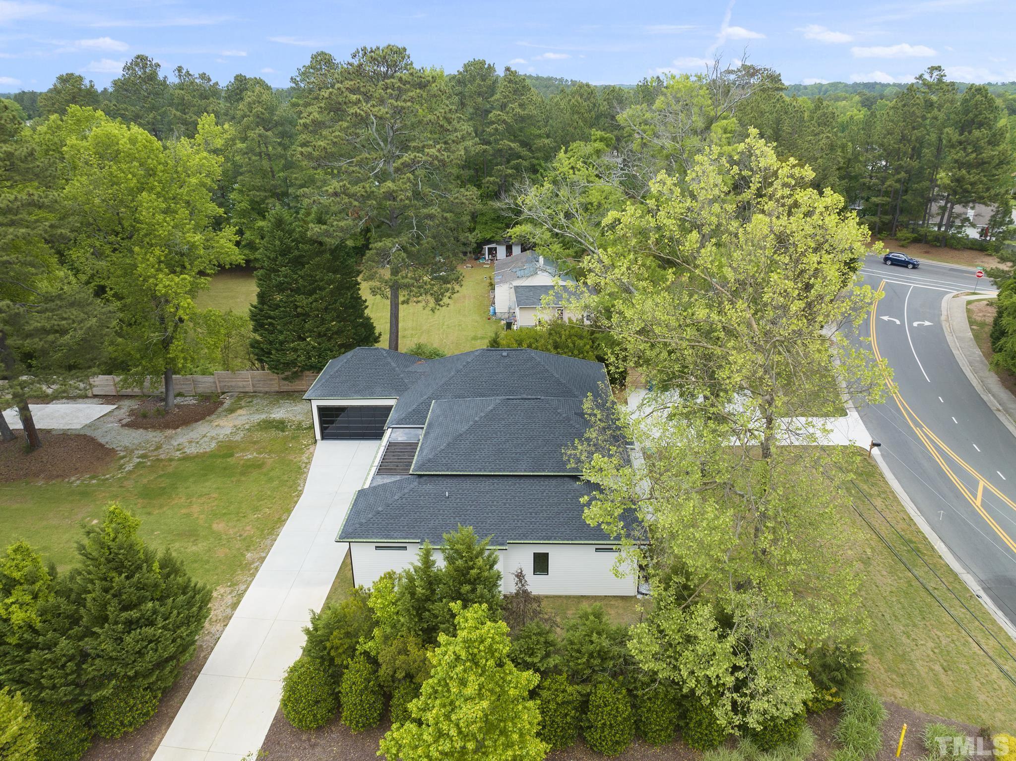1920 Cook Road Durham, NC 27713 - Photo 42 of 43 an aerial view of a house with a yard