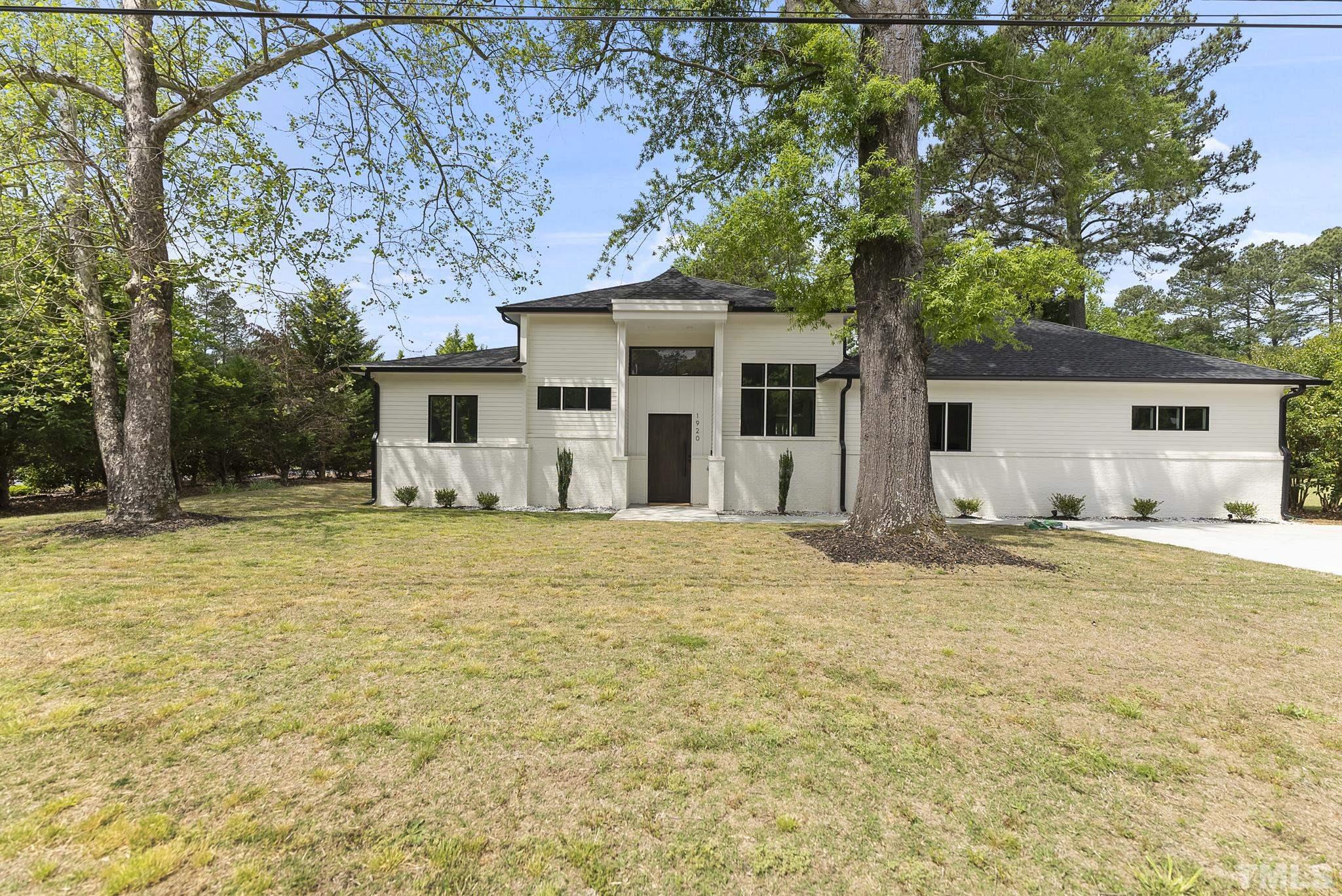 1920 Cook Road Durham, NC 27713 - Photo 43 of 43 a front view of house with yard and trees around