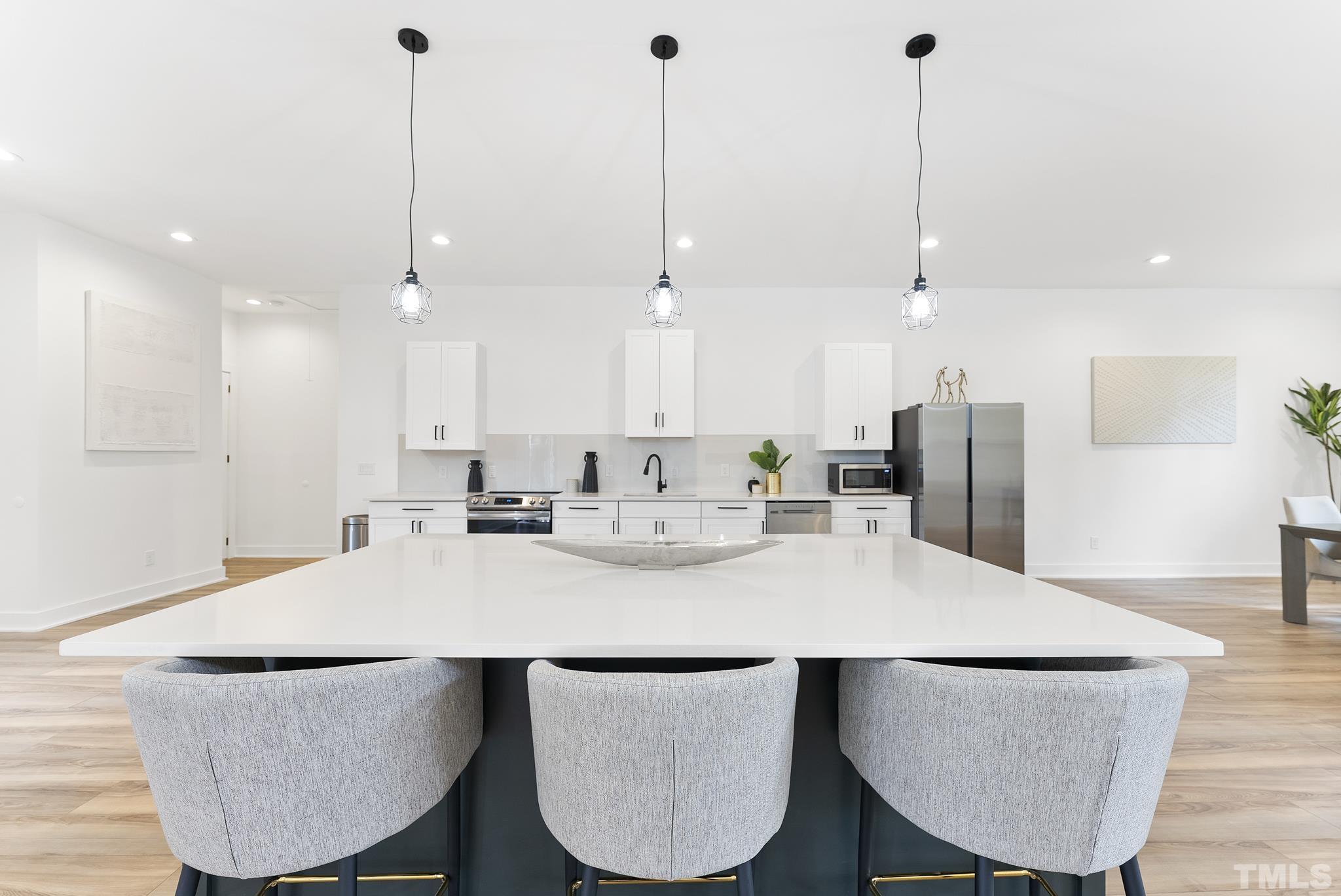 1920 Cook Road Durham, NC 27713 - Photo 7 of 43 a view of kitchen and dining area with furniture