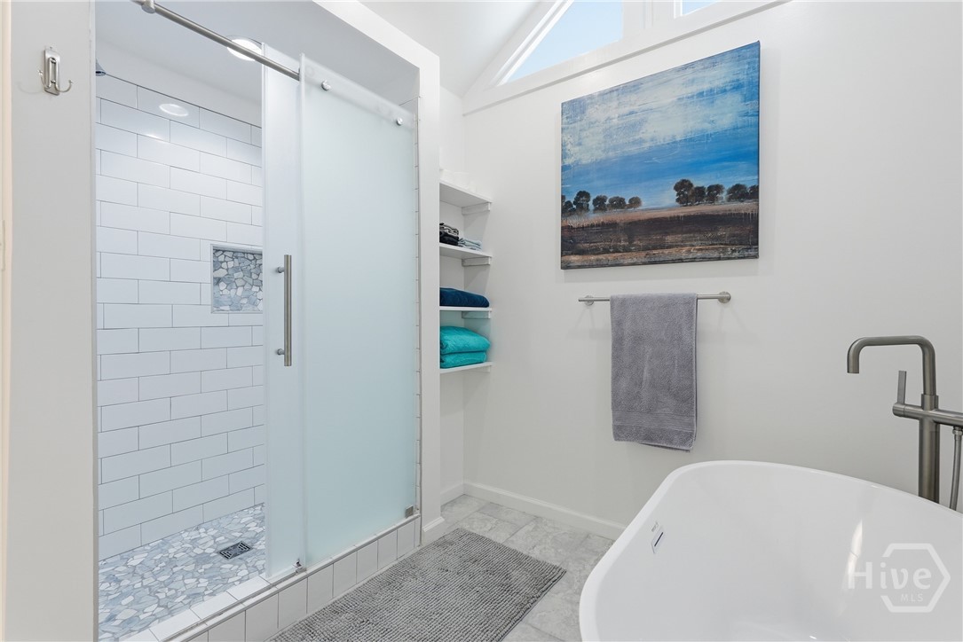 3 Rice Mill Drive Savannah, GA 31419 - Photo 16 of 37 Primary Bathroom is bright and features a separate tiled shower.