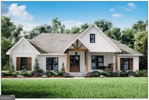 285 Madison Road Monticello, GA 31064 - Photo 1 of 15 a front view of a house with a yard and green space