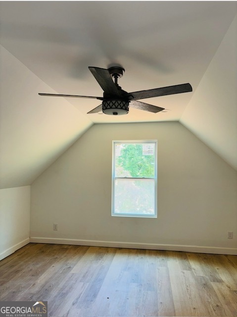 285 Madison Road Monticello, GA 31064 - Photo 13 of 15 an empty room with wooden floor fan and windows