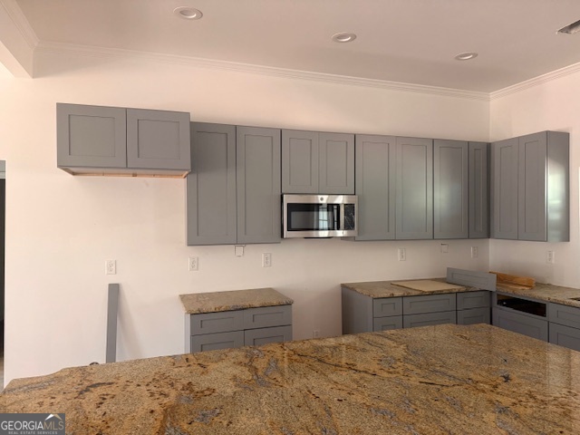 285 Madison Road Monticello, GA 31064 - Photo 2 of 15 a kitchen with granite countertop a sink and a stove top oven