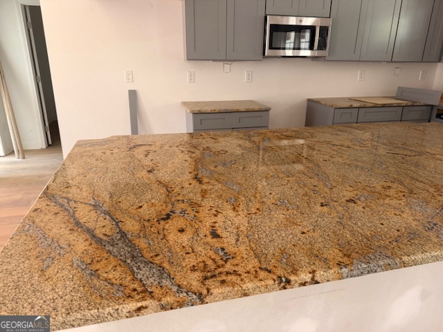 285 Madison Road Monticello, GA 31064 - Photo 3 of 15 a bathroom with a sink and a microwave