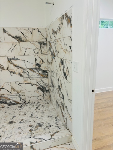 285 Madison Road Monticello, GA 31064 - Photo 6 of 15 a bathroom with a bathtub and shower