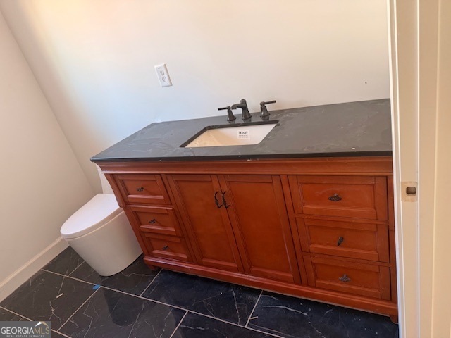285 Madison Road Monticello, GA 31064 - Photo 8 of 15 a bathroom with a sink and a mirror