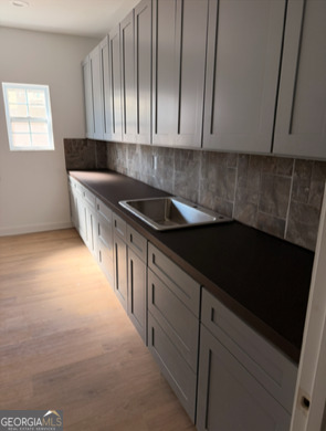 285 Madison Road Monticello, GA 31064 - Photo 10 of 15 a kitchen with a sink and cabinets