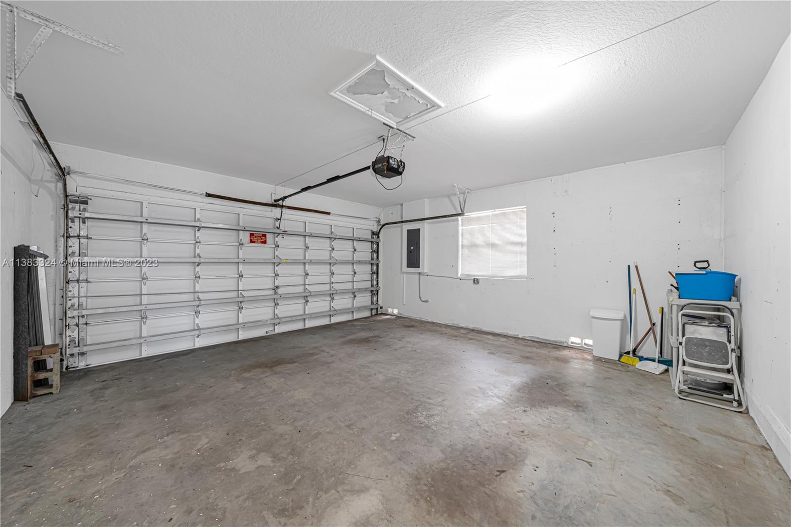 14809 Southwest 180th Street Miami, FL 33187 - Photo 32 of 38 a view of a garage