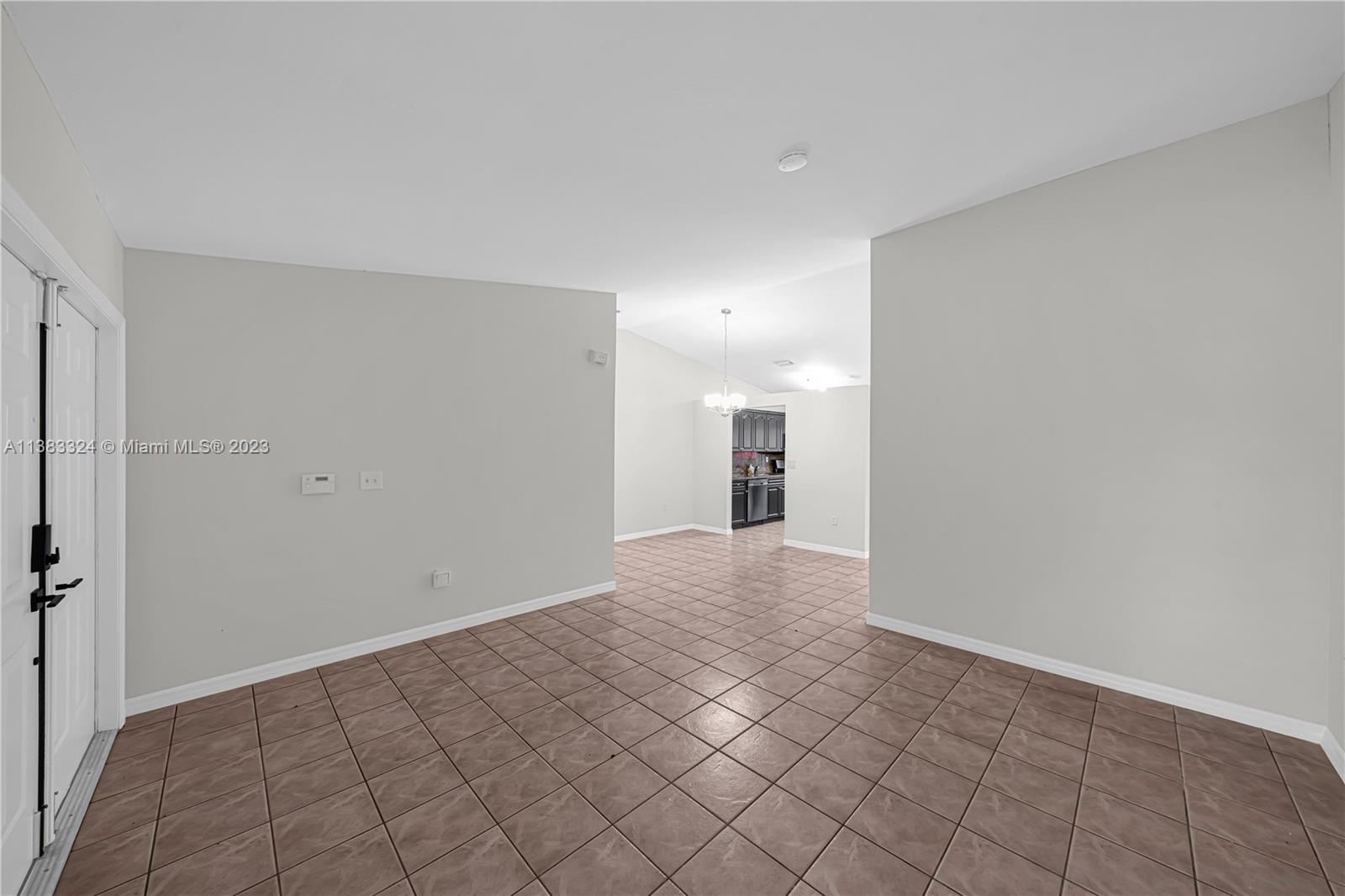 14809 Southwest 180th Street Miami, FL 33187 - Photo 10 of 38 a view of an empty room