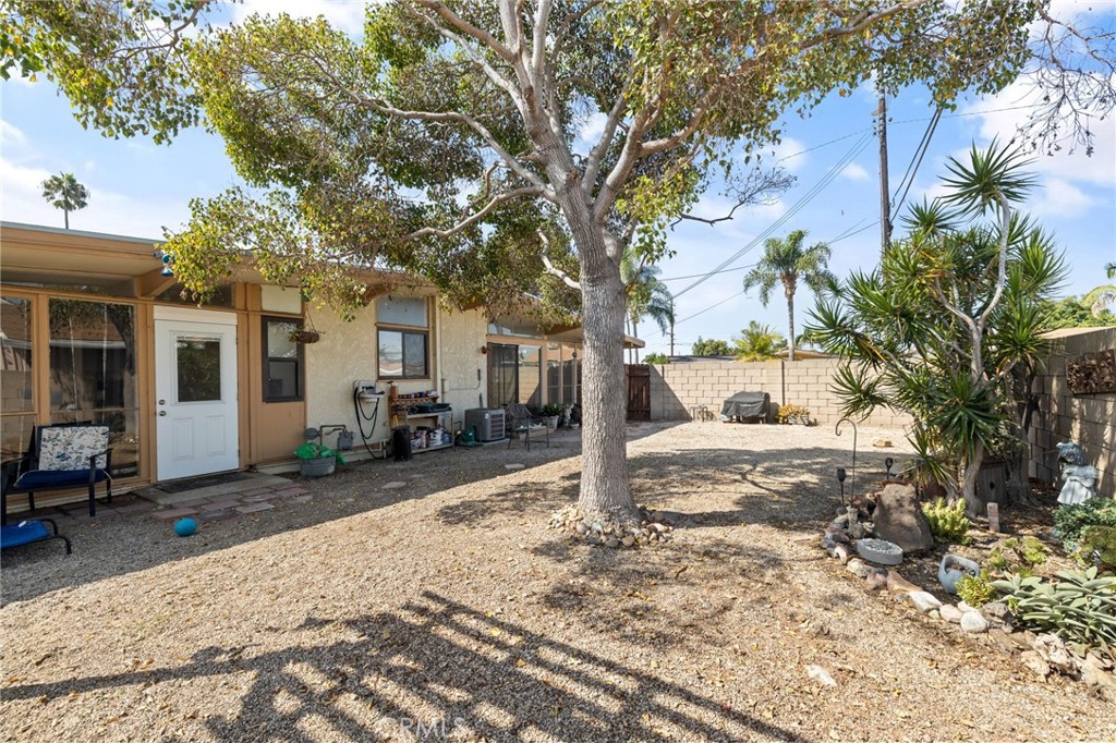 2273 West Judith Lane Anaheim, CA 92804 - Photo 13 of 13 a view of a backyard with a tree