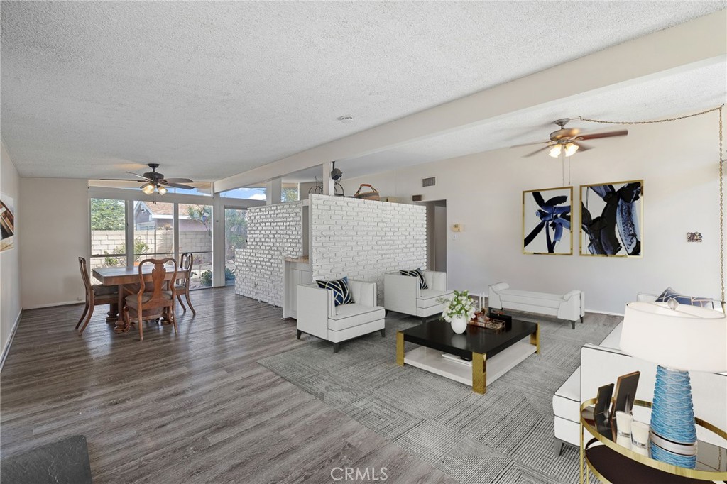 2273 West Judith Lane Anaheim, CA 92804 - Photo 4 of 13 a living room with furniture and a table