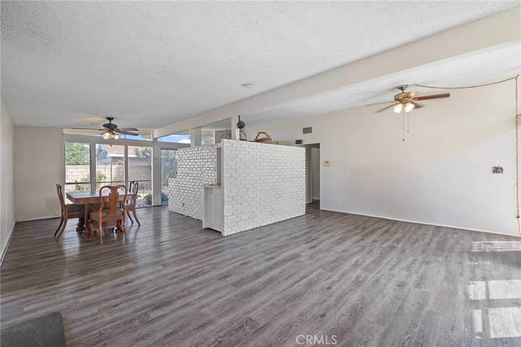 2273 West Judith Lane Anaheim, CA 92804 - Photo 5 of 13 a view of dining room with furniture and wooden floor