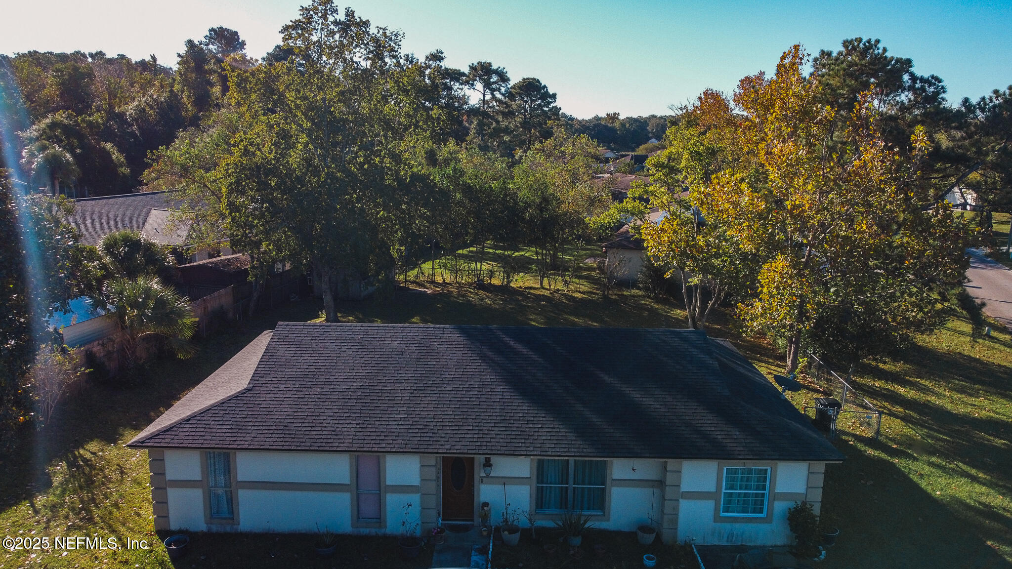 a house with trees in front of it