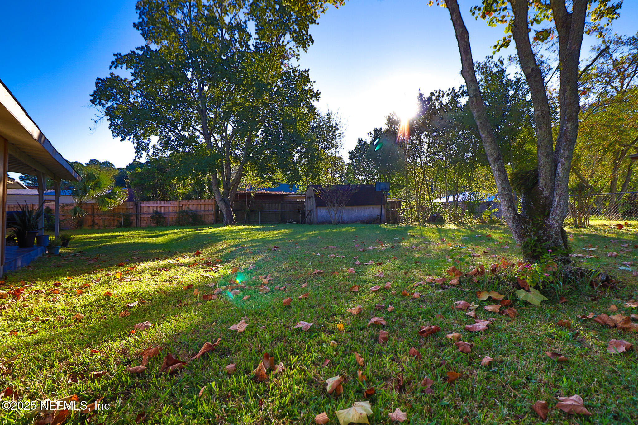 2847 Homestead Road Orange Park, FL 32065 - Photo 12 of 26 a view of a house with a yard porch and sitting area