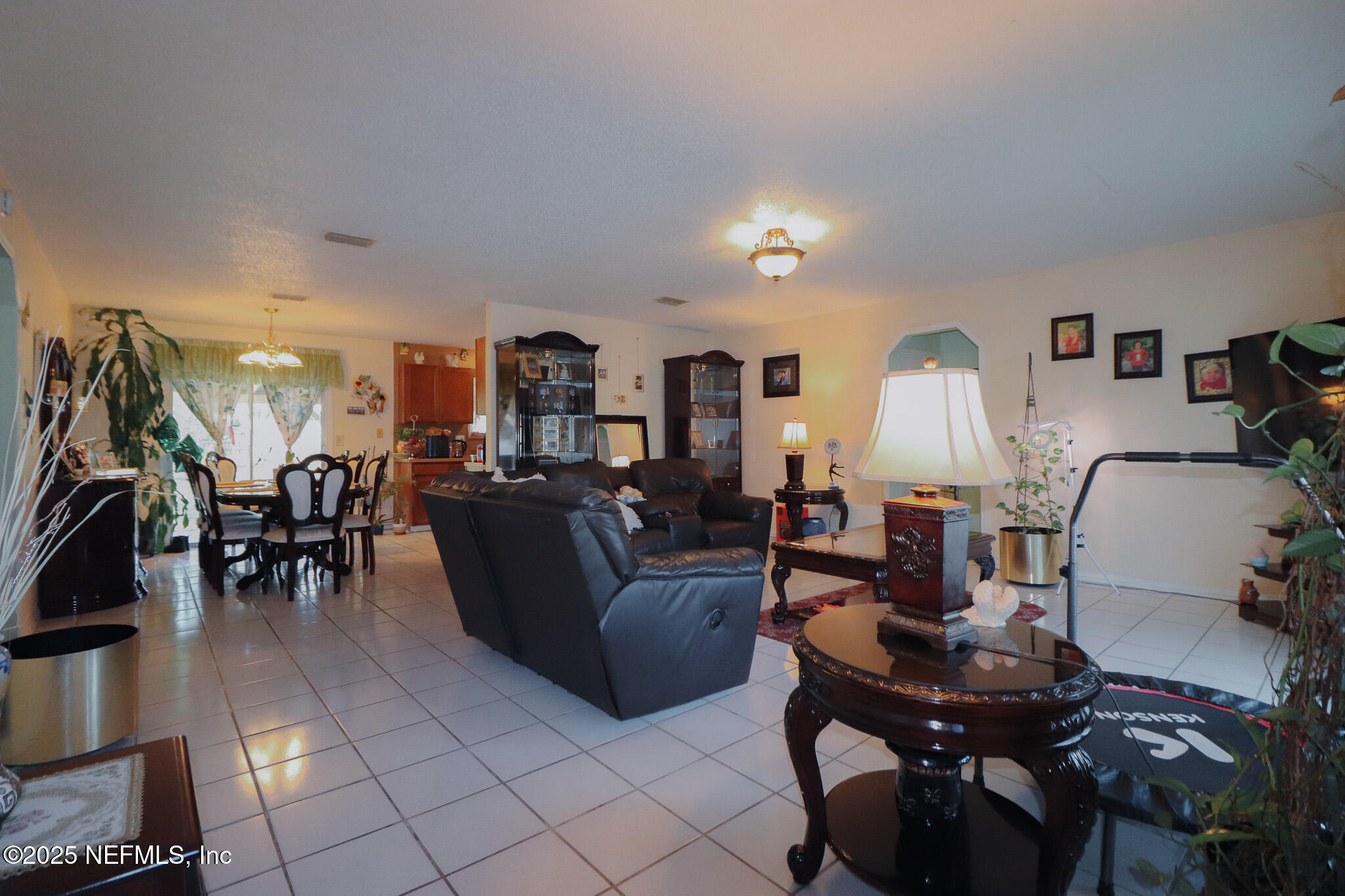 2847 Homestead Road Orange Park, FL 32065 - Photo 15 of 26 a living room with furniture and wooden floor