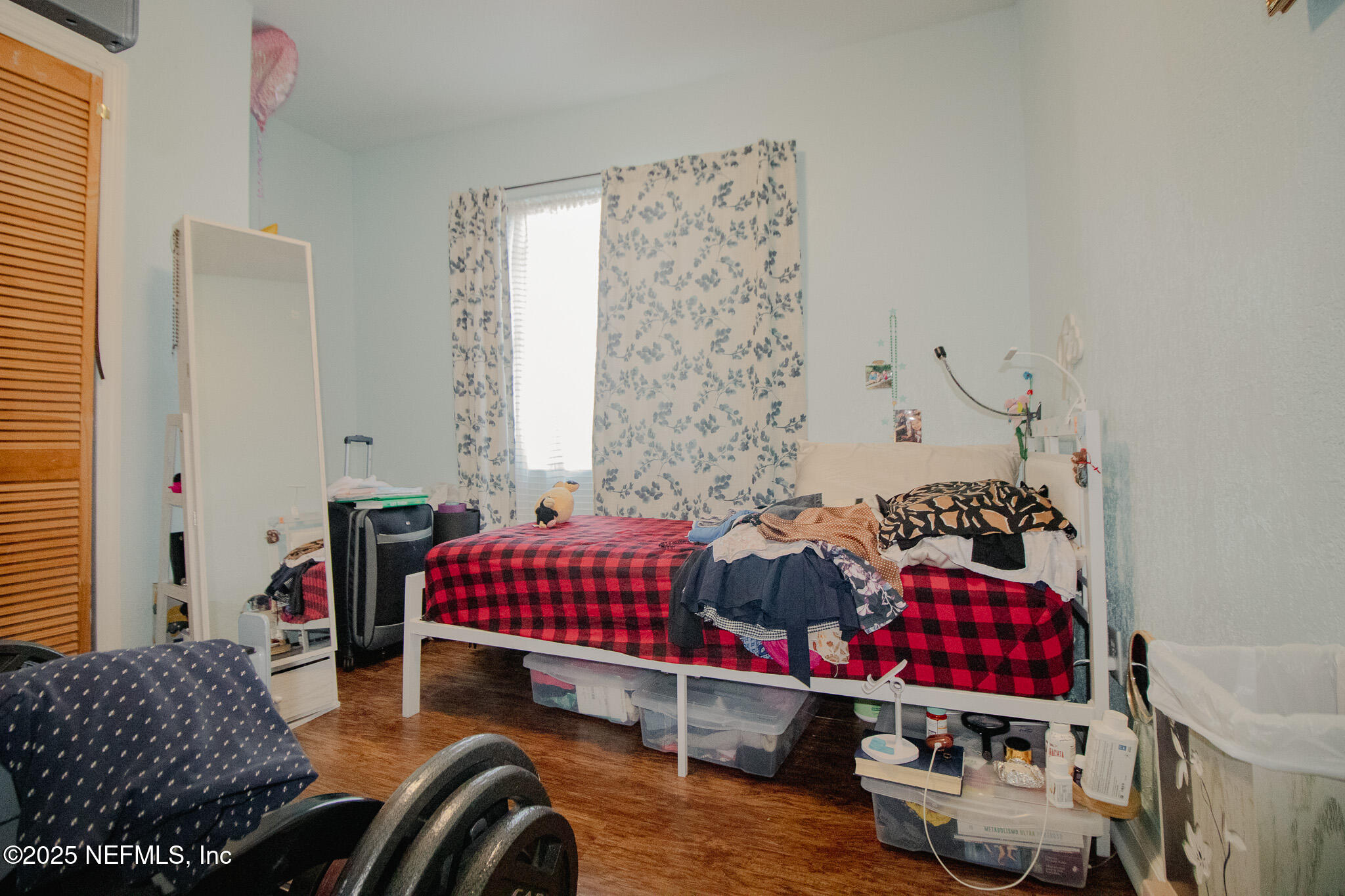 2847 Homestead Road Orange Park, FL 32065 - Photo 25 of 26 a living room with furniture and a gate