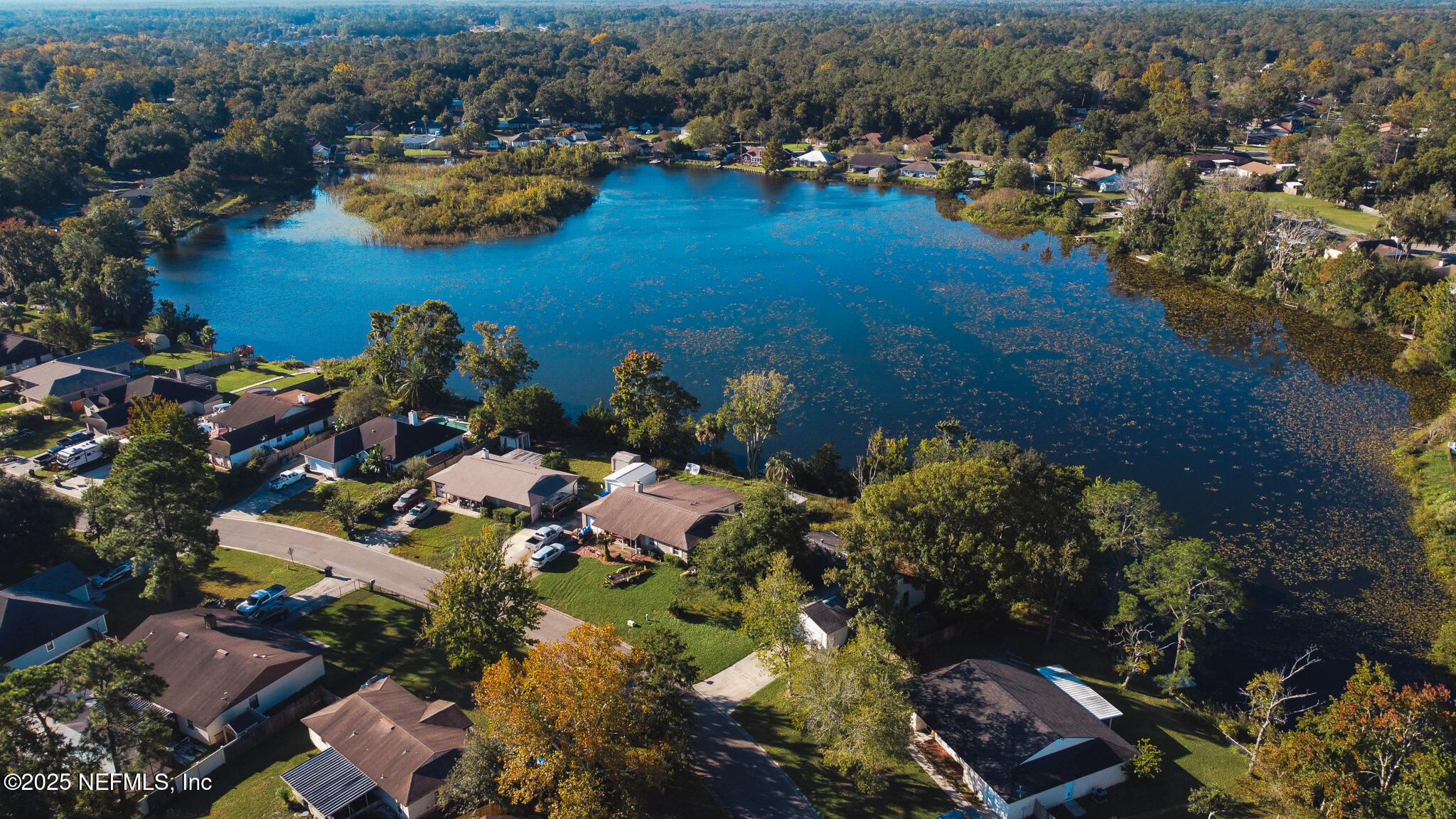 2847 Homestead Road Orange Park, FL 32065 - Photo 3 of 26 an aerial view of a house with a lake view