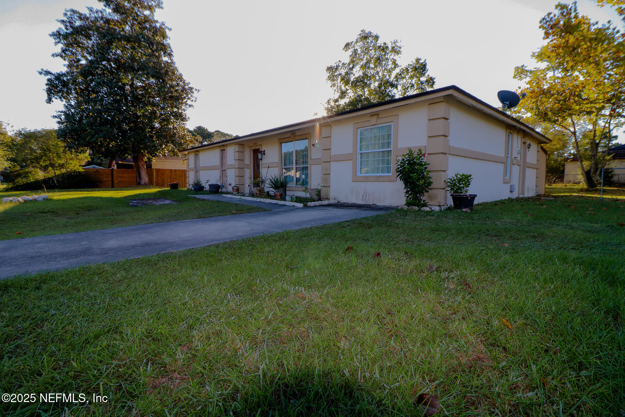 2847 Homestead Road Orange Park, FL 32065 - Photo 7 of 26 a front view of house with yard and green space