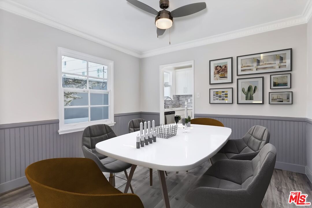 5022 Clinton Street, Unit 5022B Los Angeles, CA 90004 - Photo 5 of 22 a view of a dining room with furniture and window