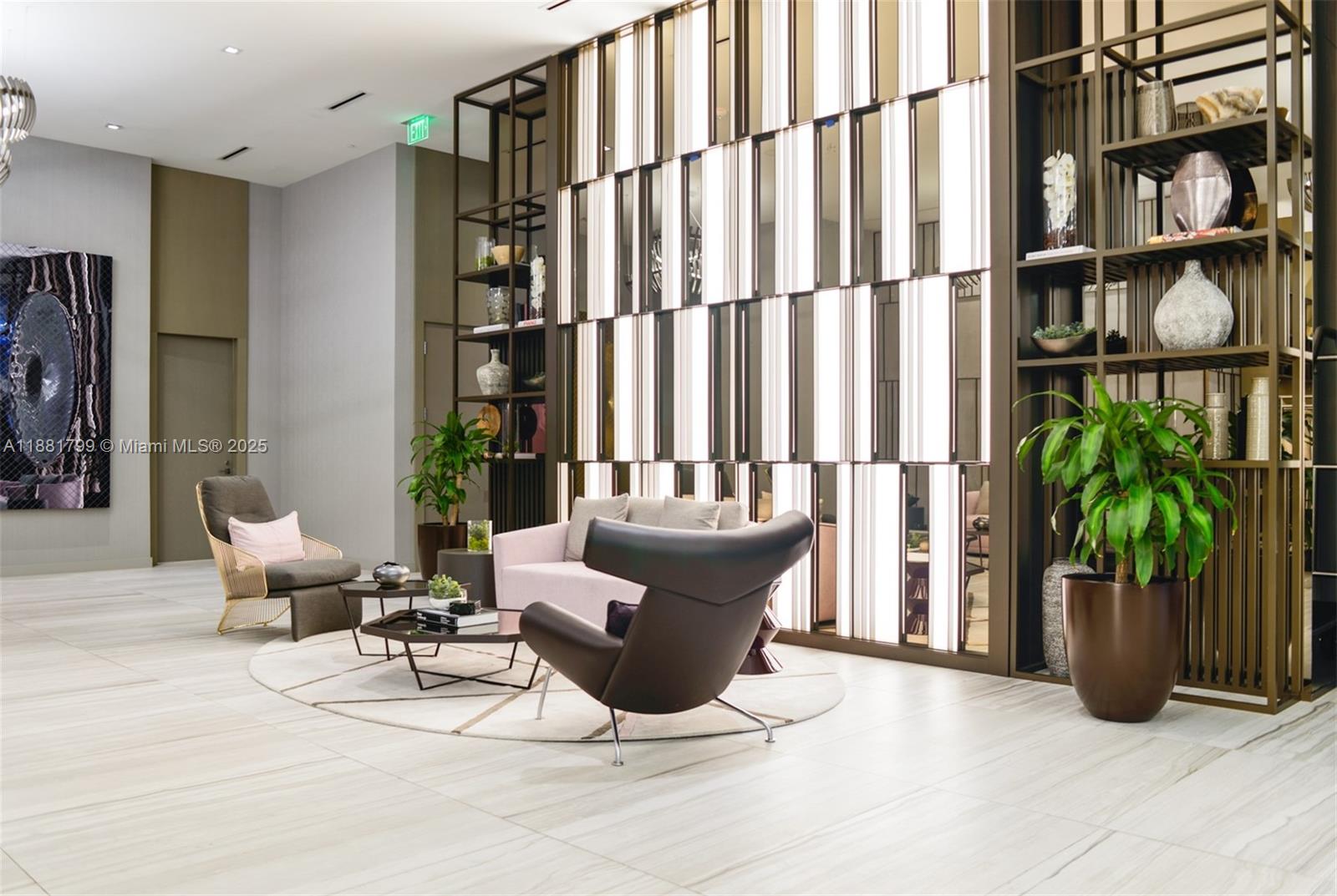 4010 South Ocean Drive, Unit R302 Hollywood, FL 33019 - Photo 29 of 34 a living room with furniture a lamp and a potted plant