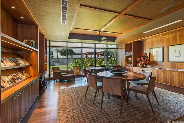 a view of a dining room with furniture window and outside view