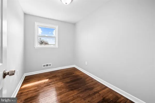 a view of small space with wooden floor