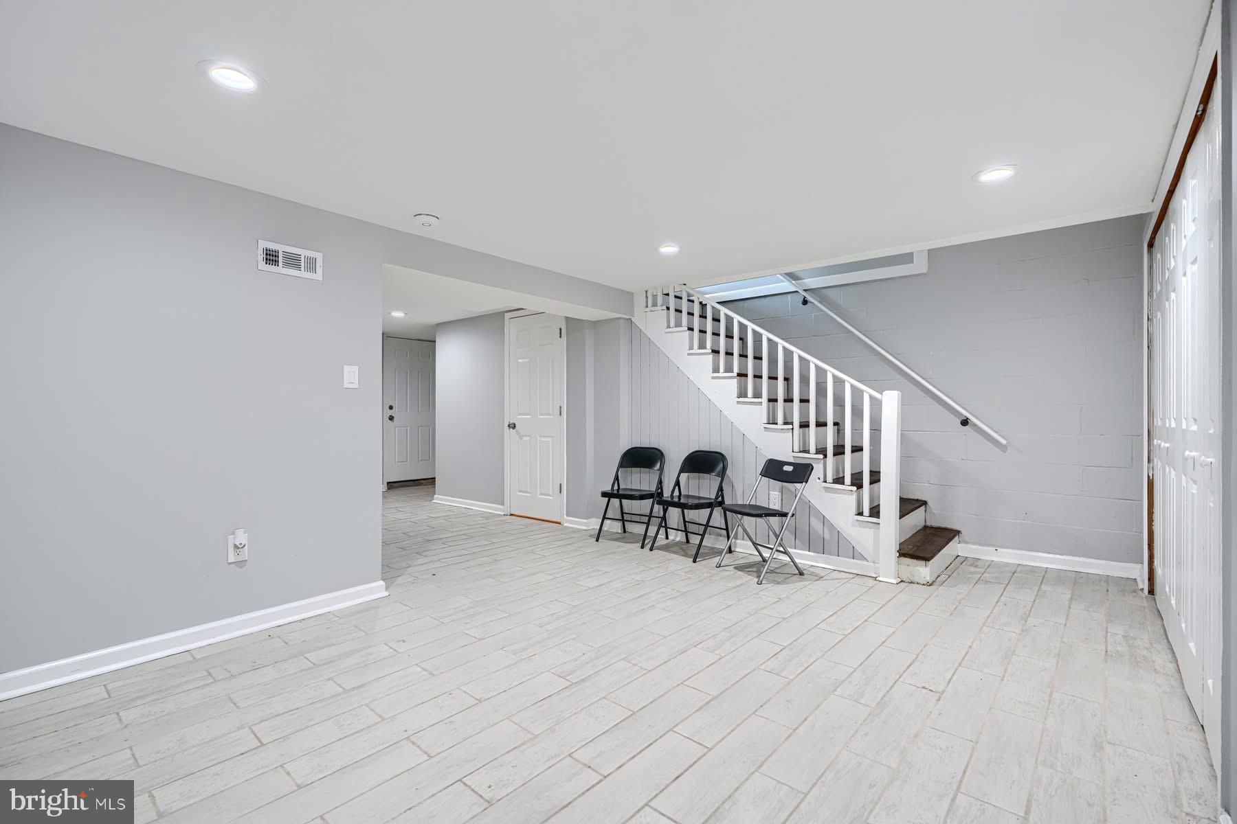 631 Charraway Road Baltimore, MD 21229 - Photo 20 of 25 a view of entryway and hall with wooden floor