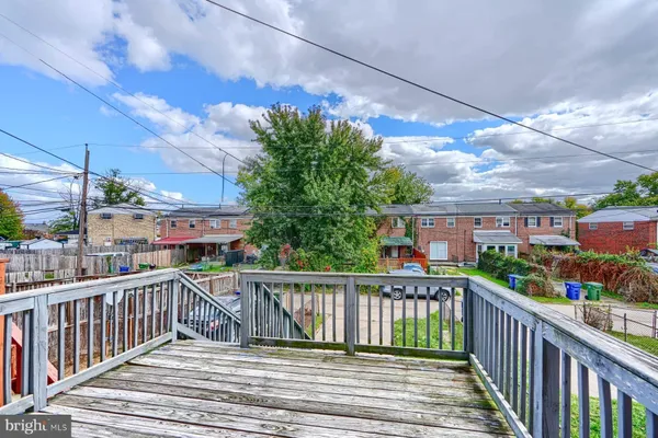 a view of a balcony with city view