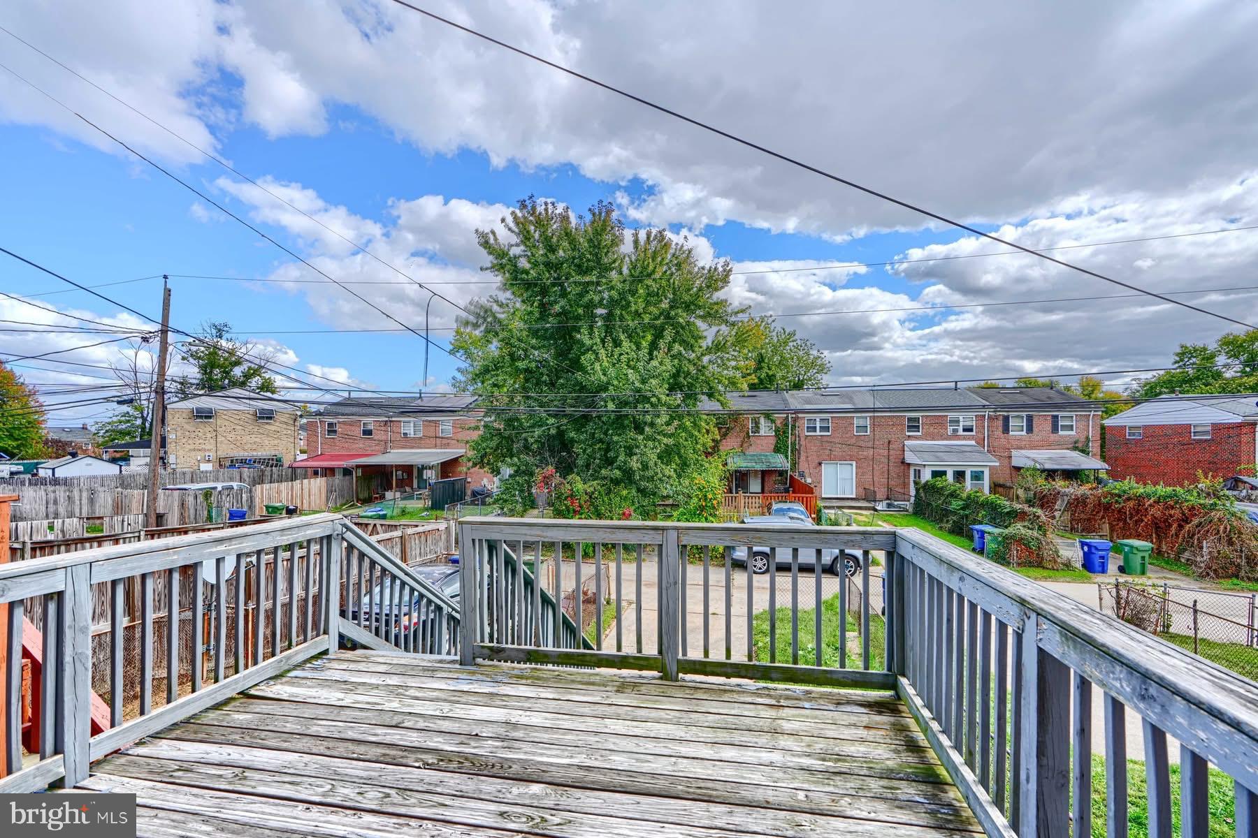 631 Charraway Road Baltimore, MD 21229 - Photo 23 of 25 a view of a balcony with city view