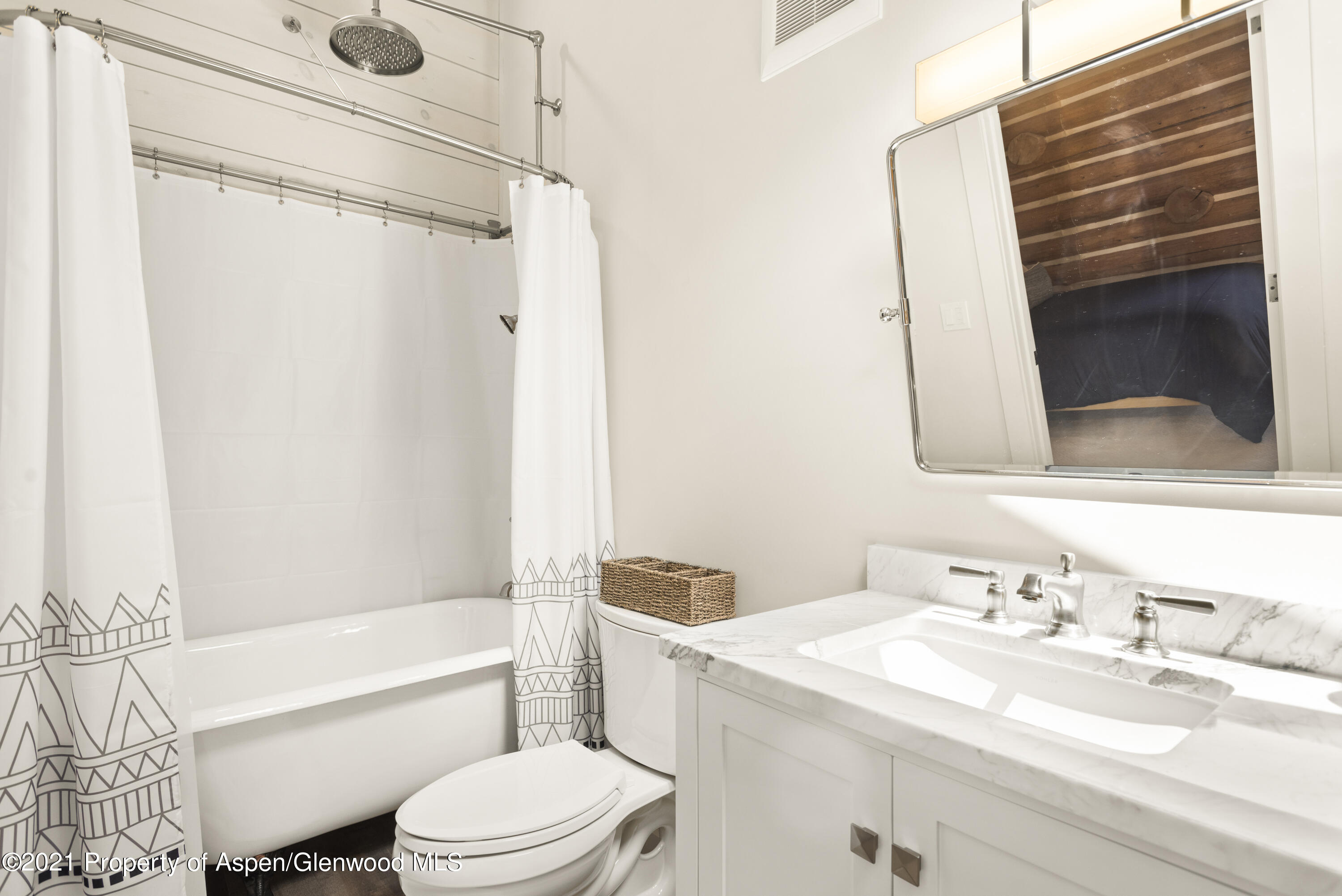 844 Hillcrest Drive Basalt, CO 81621 - Photo 16 of 24 a bathroom with a granite countertop sink toilet and shower