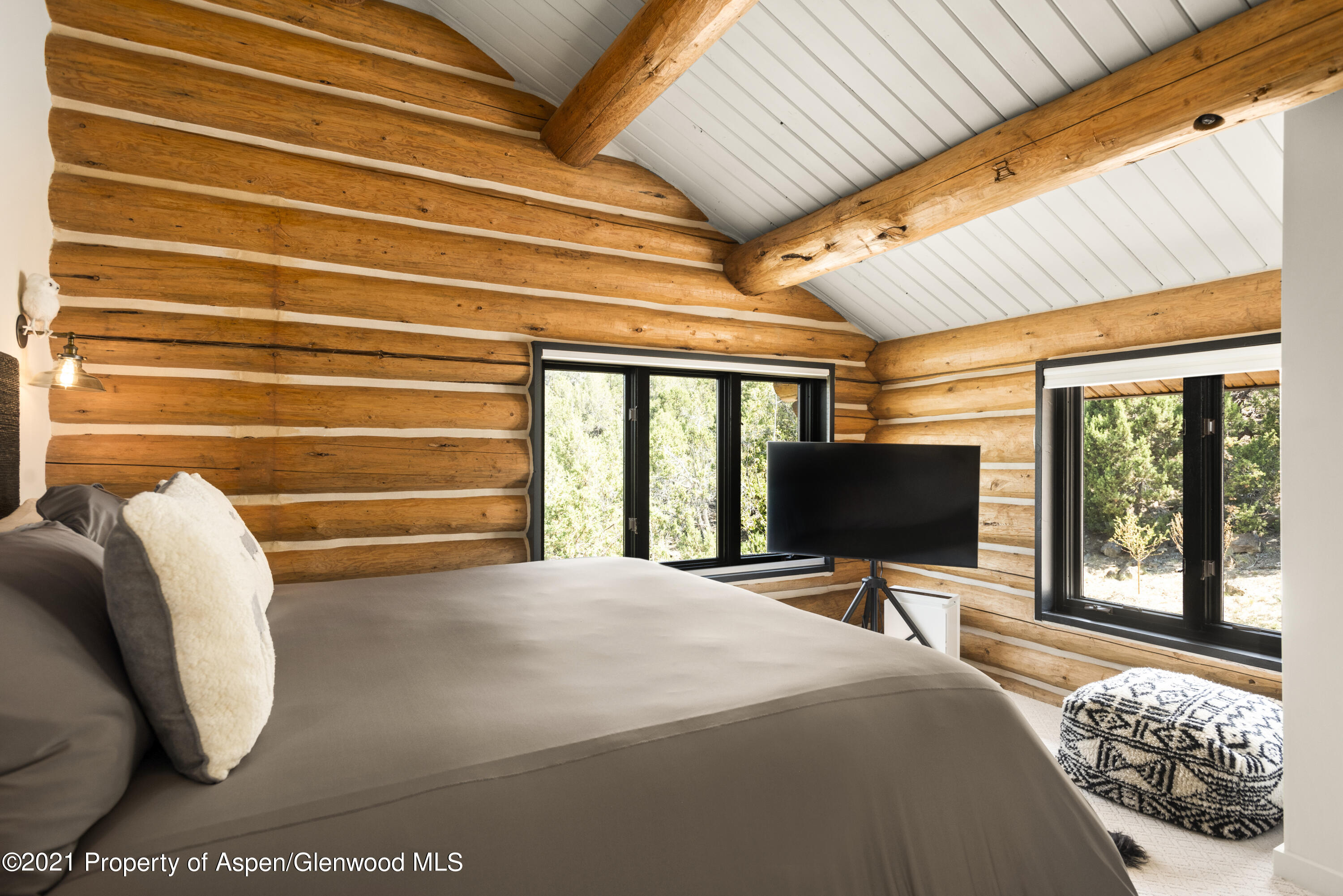 844 Hillcrest Drive Basalt, CO 81621 - Photo 17 of 24 a bedroom with a bed and large window