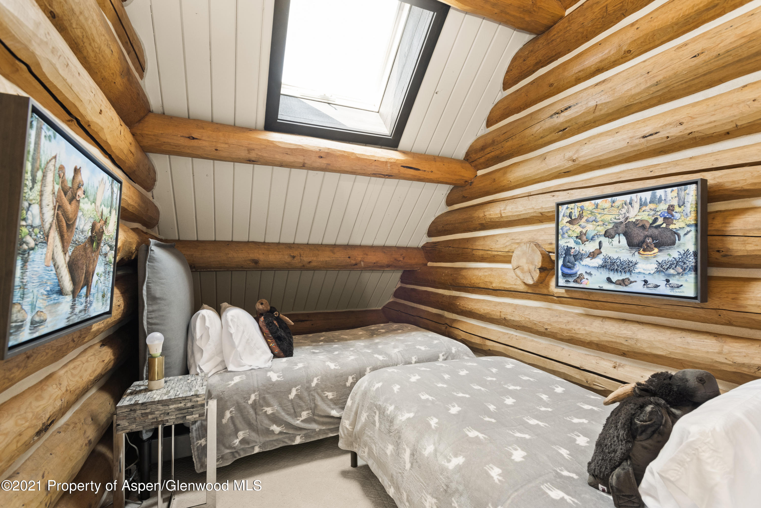 844 Hillcrest Drive Basalt, CO 81621 - Photo 19 of 24 a view of bedroom with two beds and a painting on the wall