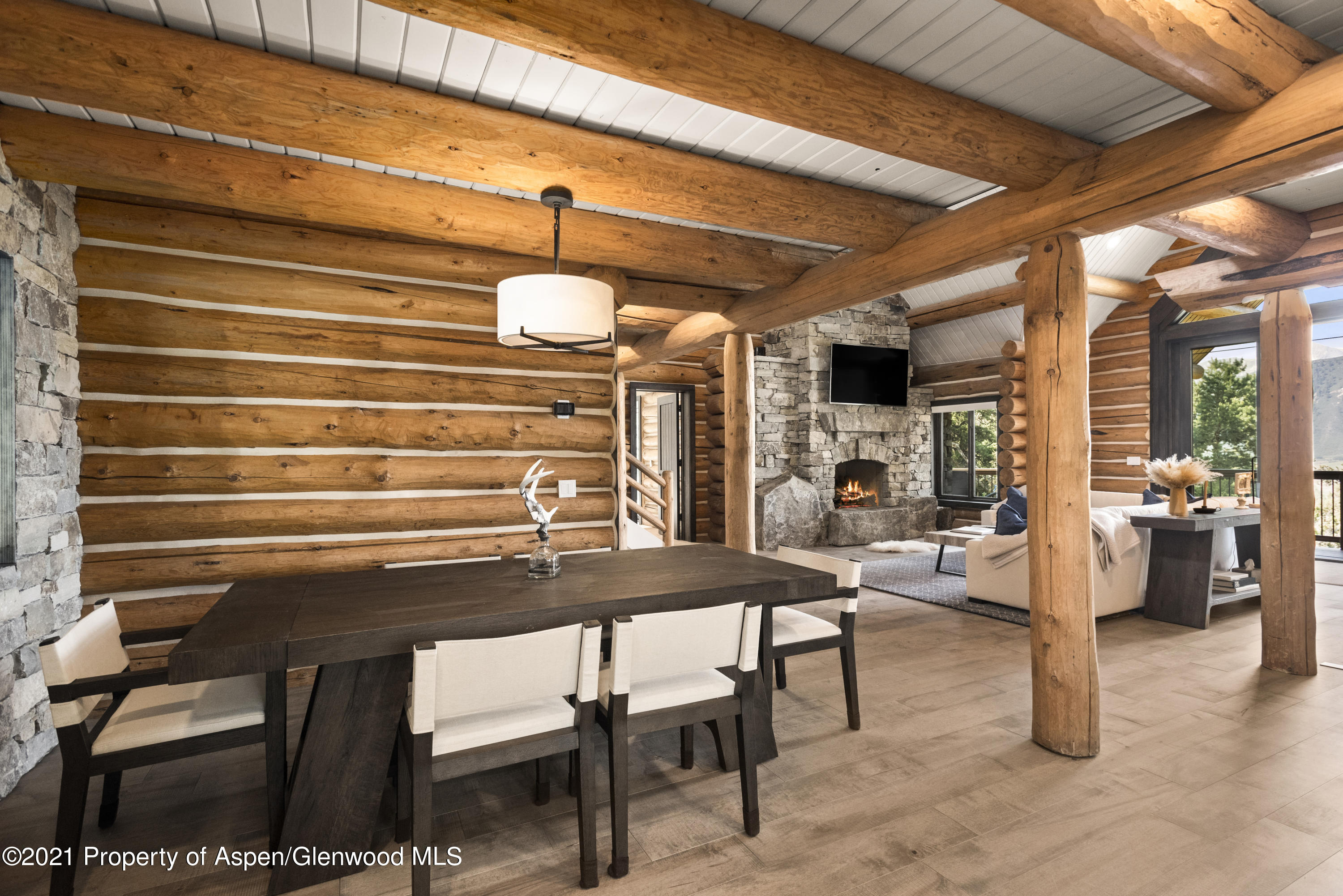 844 Hillcrest Drive Basalt, CO 81621 - Photo 4 of 24 a view of a dining room with furniture and a chandelier
