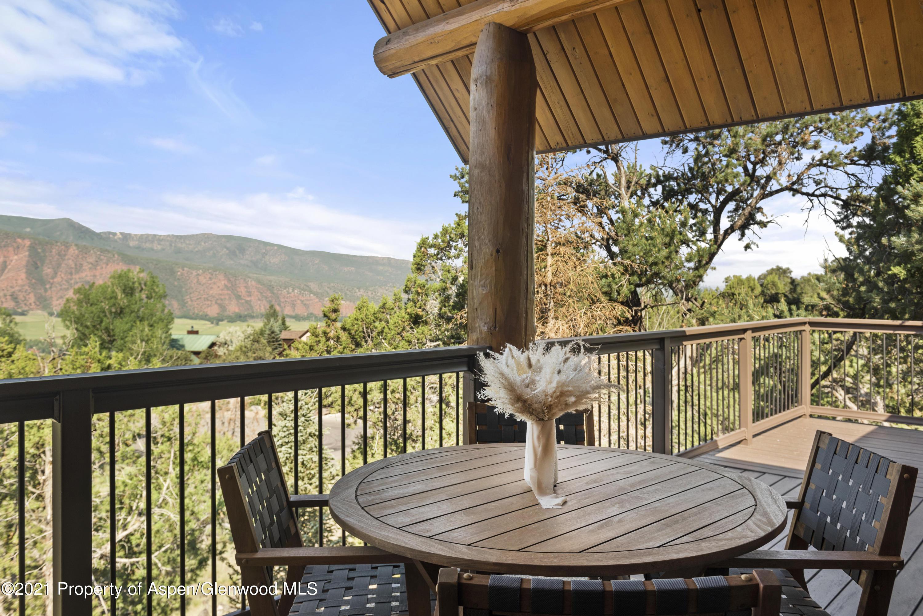 844 Hillcrest Drive Basalt, CO 81621 - Photo 7 of 24 a view of balcony with wooden floor and outdoor seating