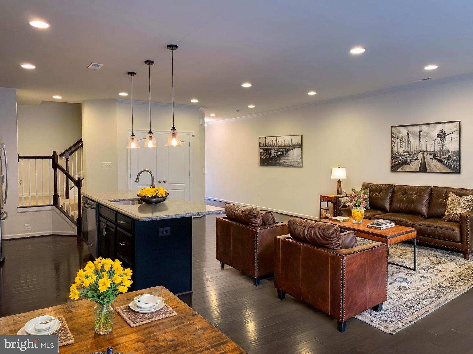 42482 Benfold Square Ashburn, VA 20148 - Photo 11 of 34 a living room with furniture and wooden floor