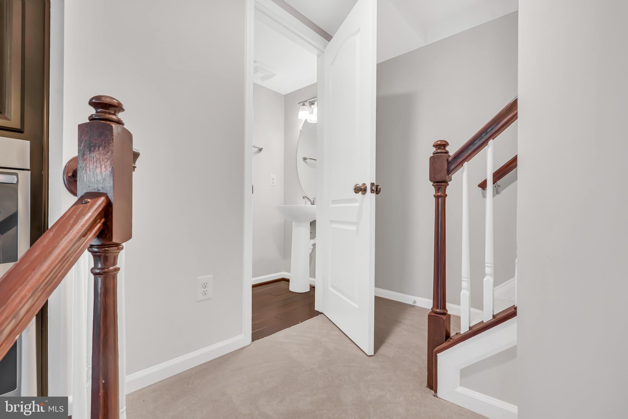 42482 Benfold Square Ashburn, VA 20148 - Photo 13 of 34 a view of an entryway with staircase