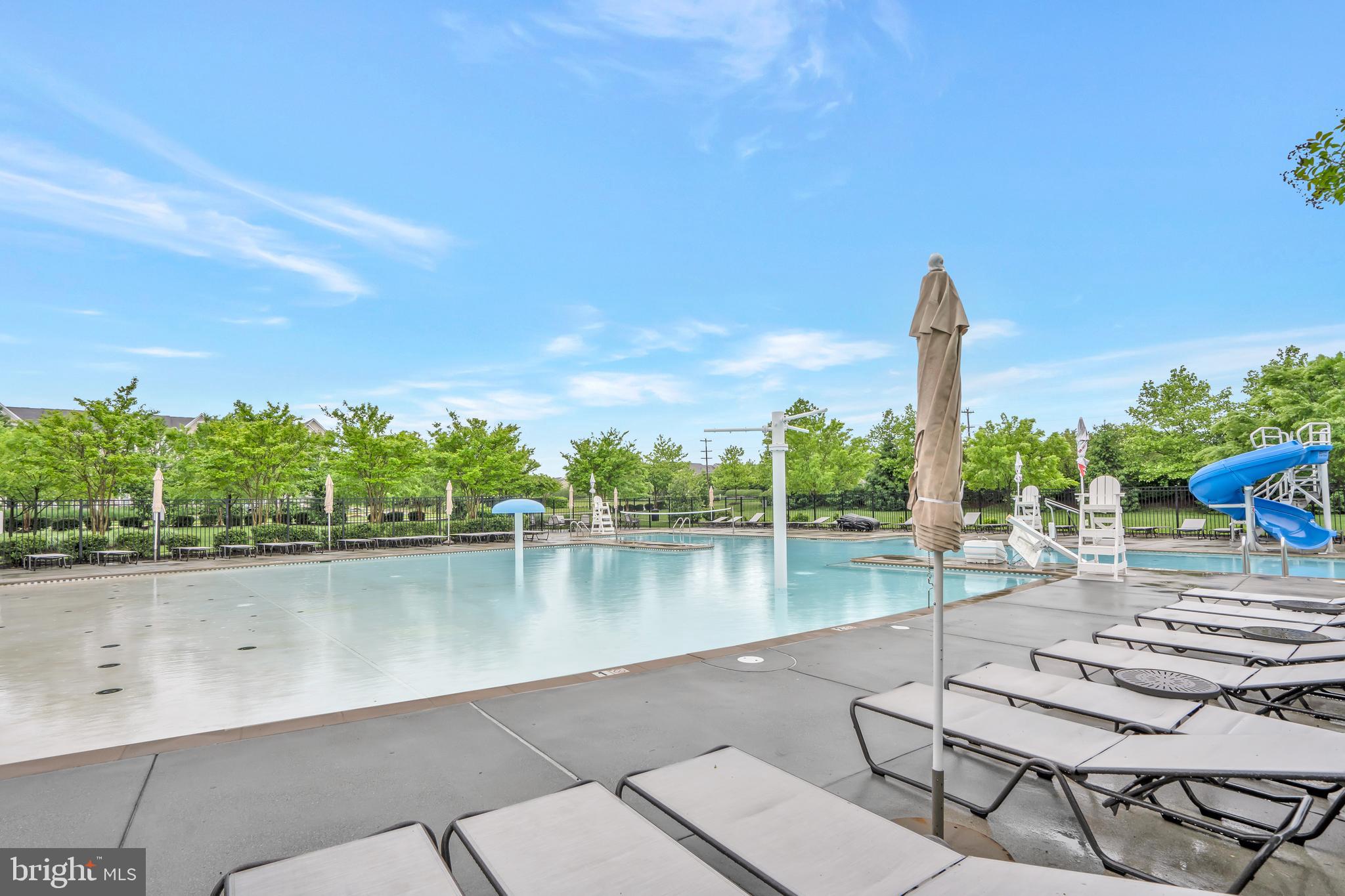 42482 Benfold Square Ashburn, VA 20148 - Photo 28 of 34 a view of a lake with a table and chairs