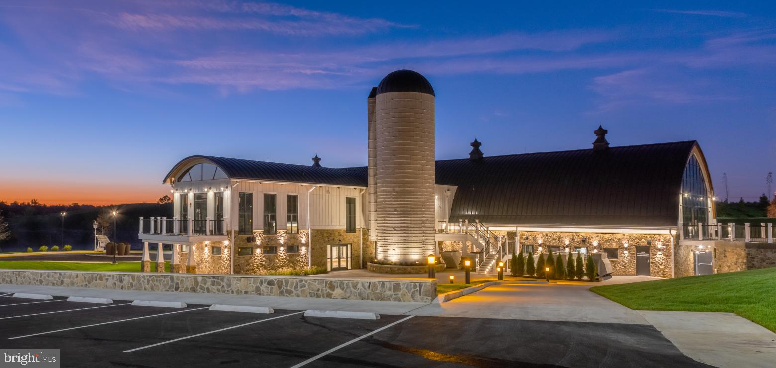 42482 Benfold Square Ashburn, VA 20148 - Photo 32 of 34 a front view of a house with a yard