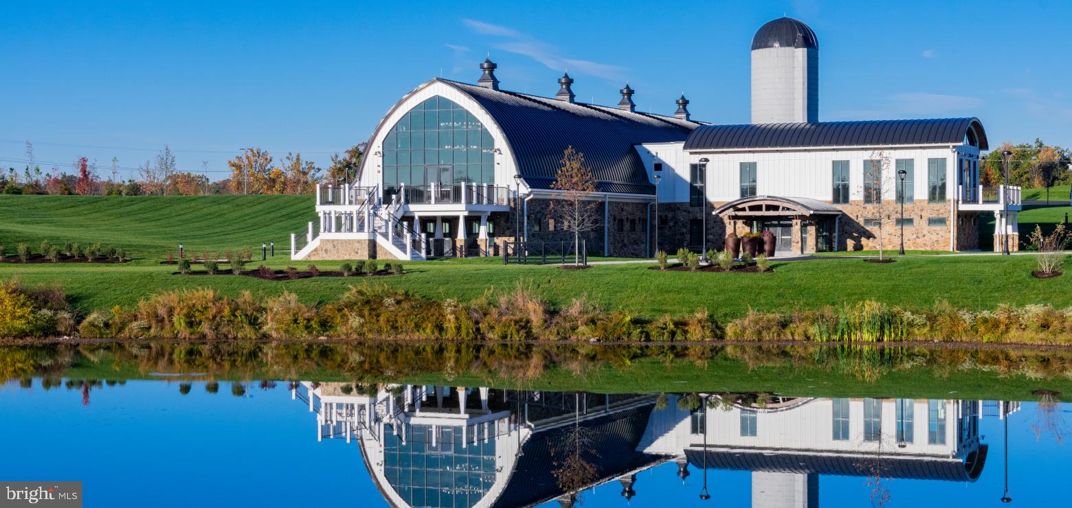 42482 Benfold Square Ashburn, VA 20148 - Photo 33 of 34 a front view of a house with garden