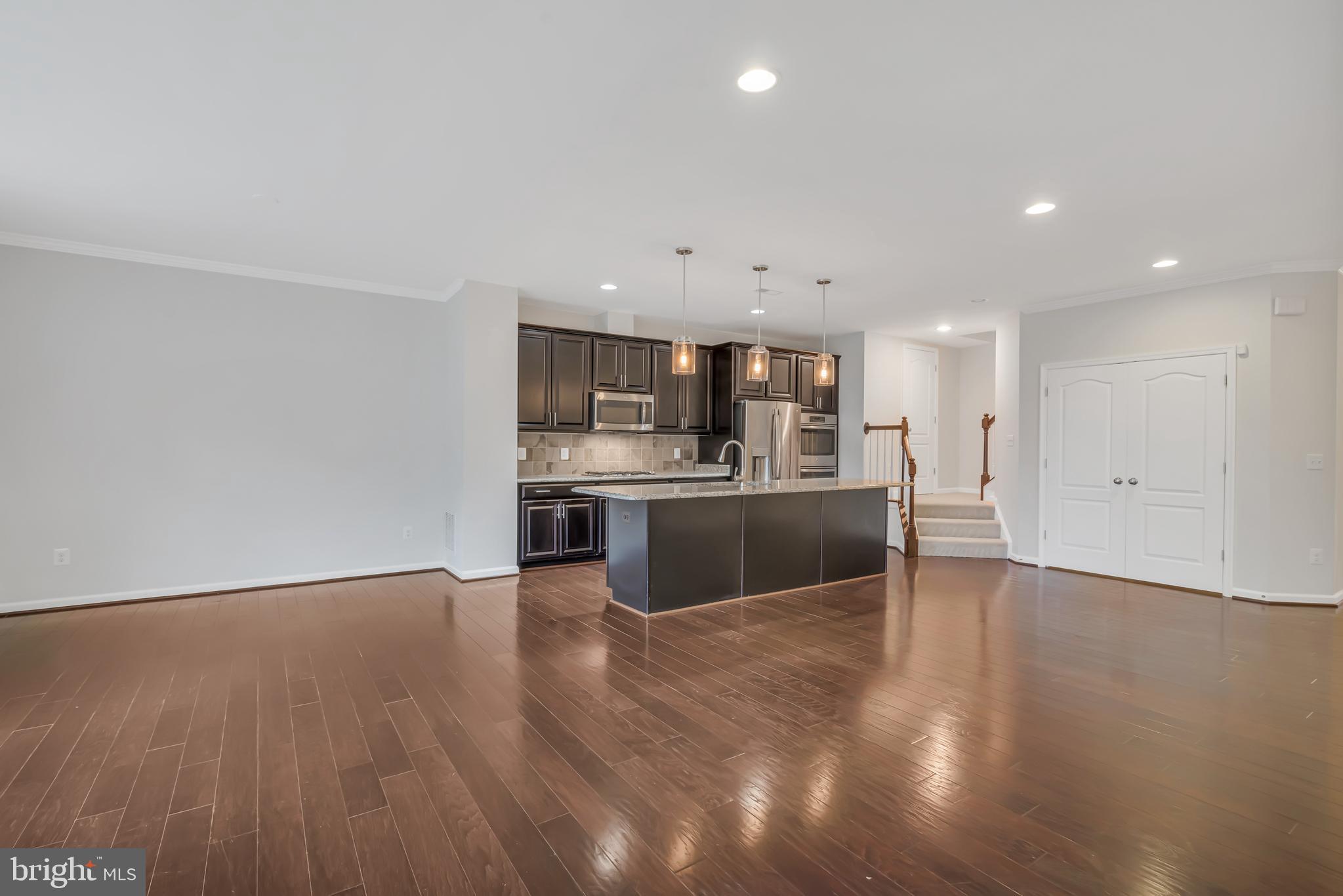 42482 Benfold Square Ashburn, VA 20148 - Photo 7 of 34 a view of kitchen with wooden floor