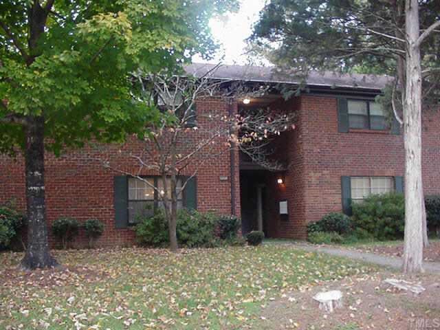 5808 E Falls Of Neuse Road Raleigh, NC 27609 - Photo 1 of 1 a house with a tree in front of it