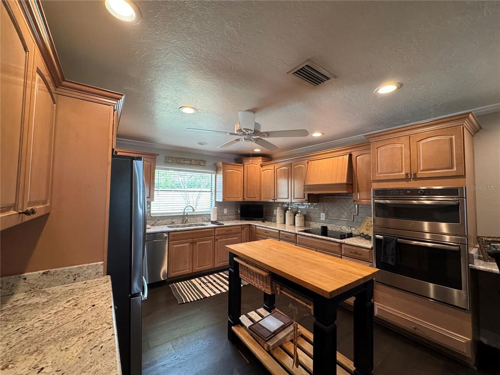334 West F Street Frostproof, FL 33843 - Photo 14 of 48 a kitchen with a sink appliances and cabinets