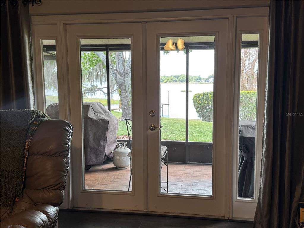 334 West F Street Frostproof, FL 33843 - Photo 27 of 48 a view of room with furniture and large window