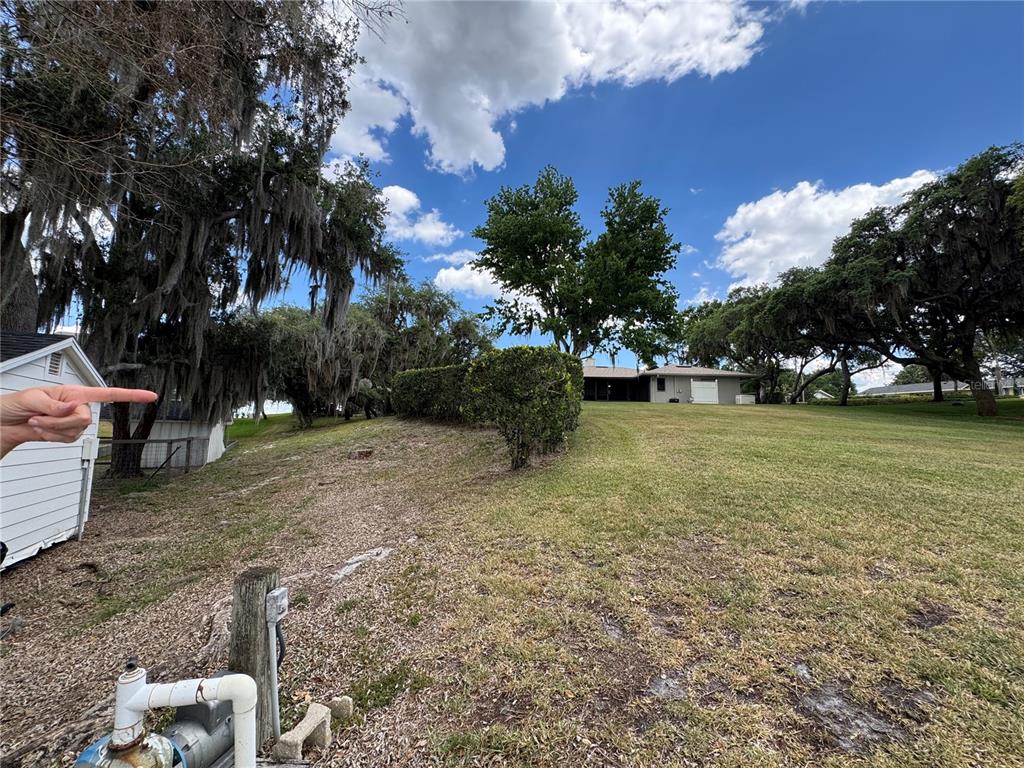 334 West F Street Frostproof, FL 33843 - Photo 37 of 48 a view of a garden with a slide