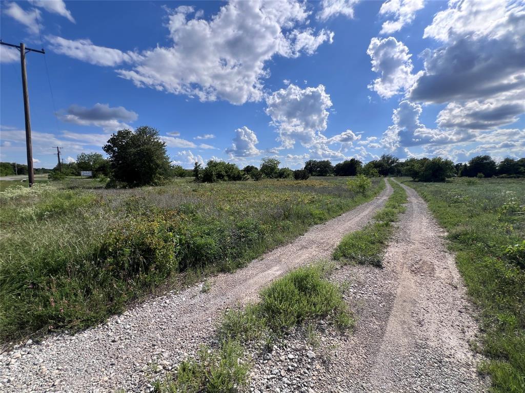 Tbd Lot 20 Tbd Trail Clyde, TX 79510 - Photo 5 of 18 a view of a pathway both side of grassy field with shrub