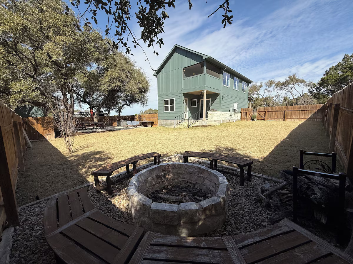 11605 Fitzhugh Road Austin, TX 78736 - Photo 5 of 24 a view of a house with backyard and sitting area