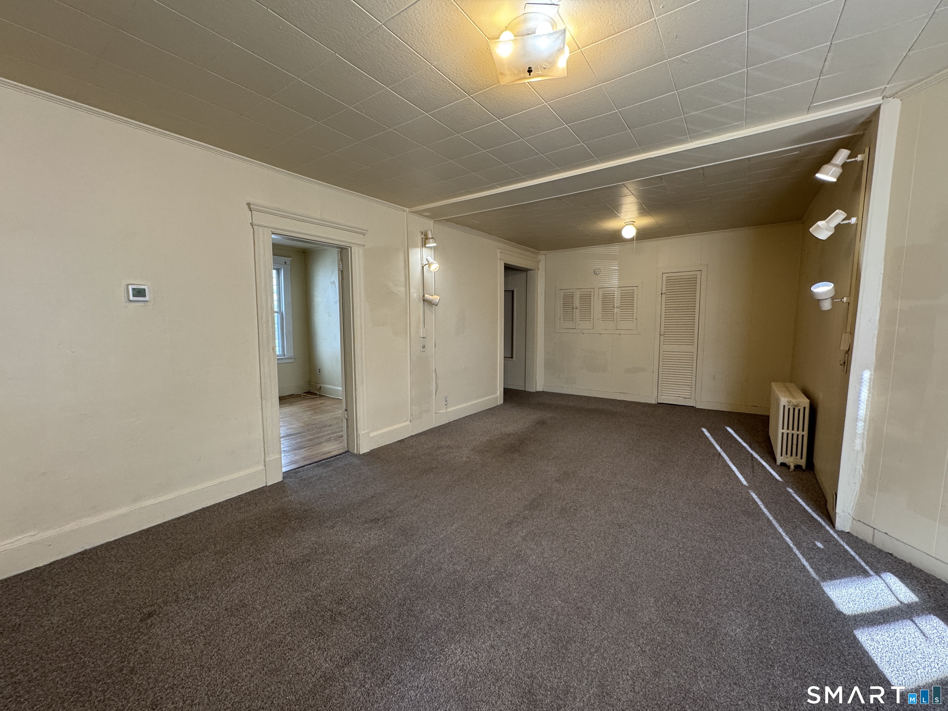 1720 East Main Street, Unit 1 Waterbury, CT 06705 - Photo 5 of 9 a view of a hallway