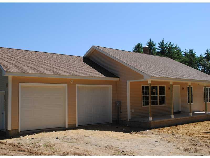 635 Perry Oliver Road Wells, ME 04090 - Photo 2 of 8 Exterior Front. Large two car garage...
