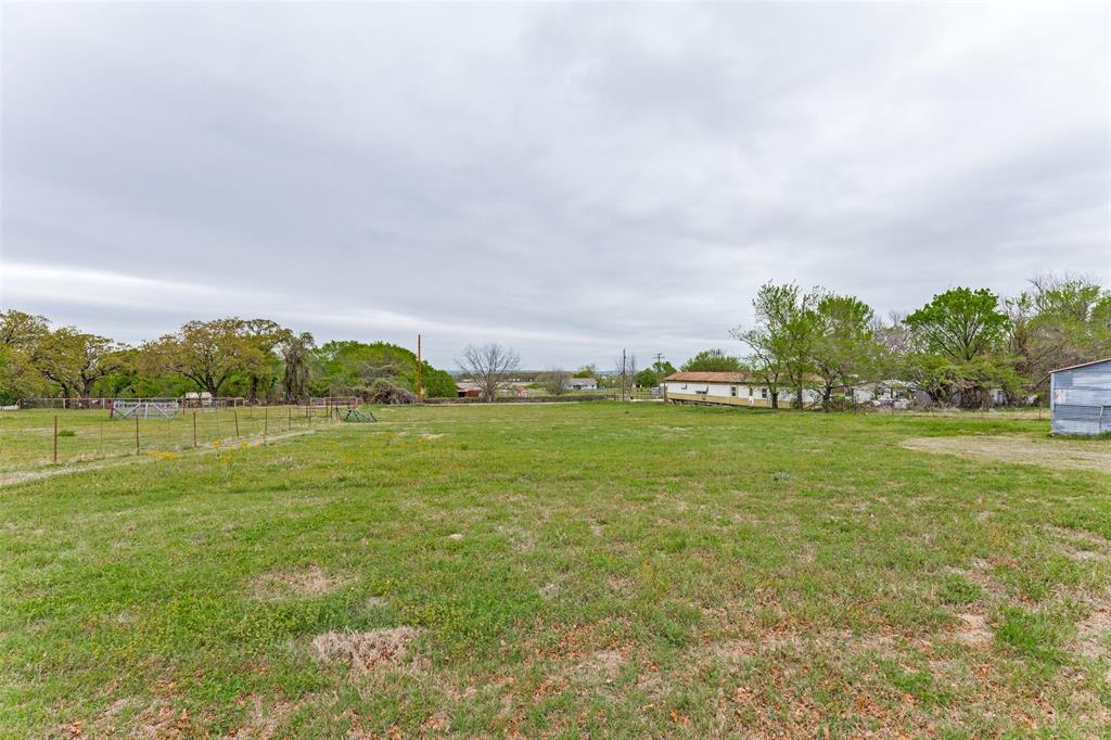 2553 East Highway 199 Springtown, TX 76082 - Photo 12 of 13 View of yard featuring a rural view
